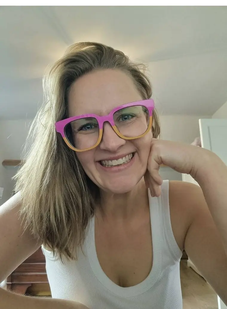 Gabi Preston-Phypers, smiling, hand to her chin